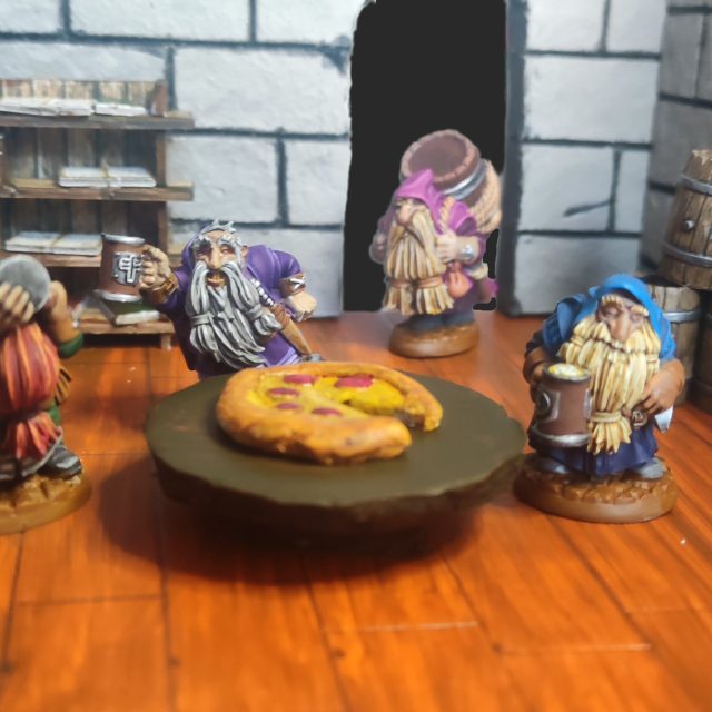 Little diorama done with the fantastic "Dwarven Brewmaster and Patrons" from Reaper Minis (SKU 30139)